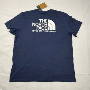 The North Face Womens Navy Blue Graphic Logo T-Shirt Large Circular Design NEW